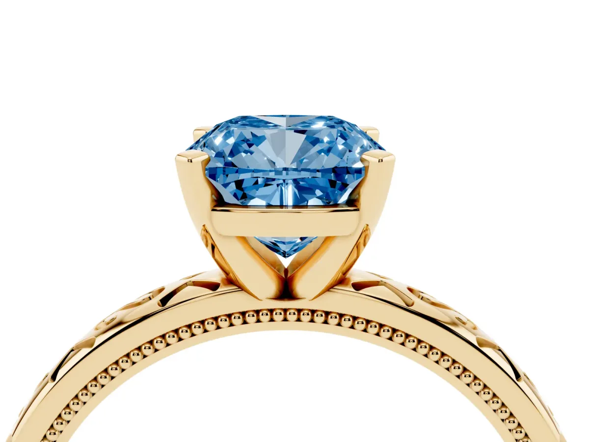 Fancy Blue Cushion Cut Solitaire Engagement Ring with Scrollwork Band and Four-Prong Setting Yellow gold
