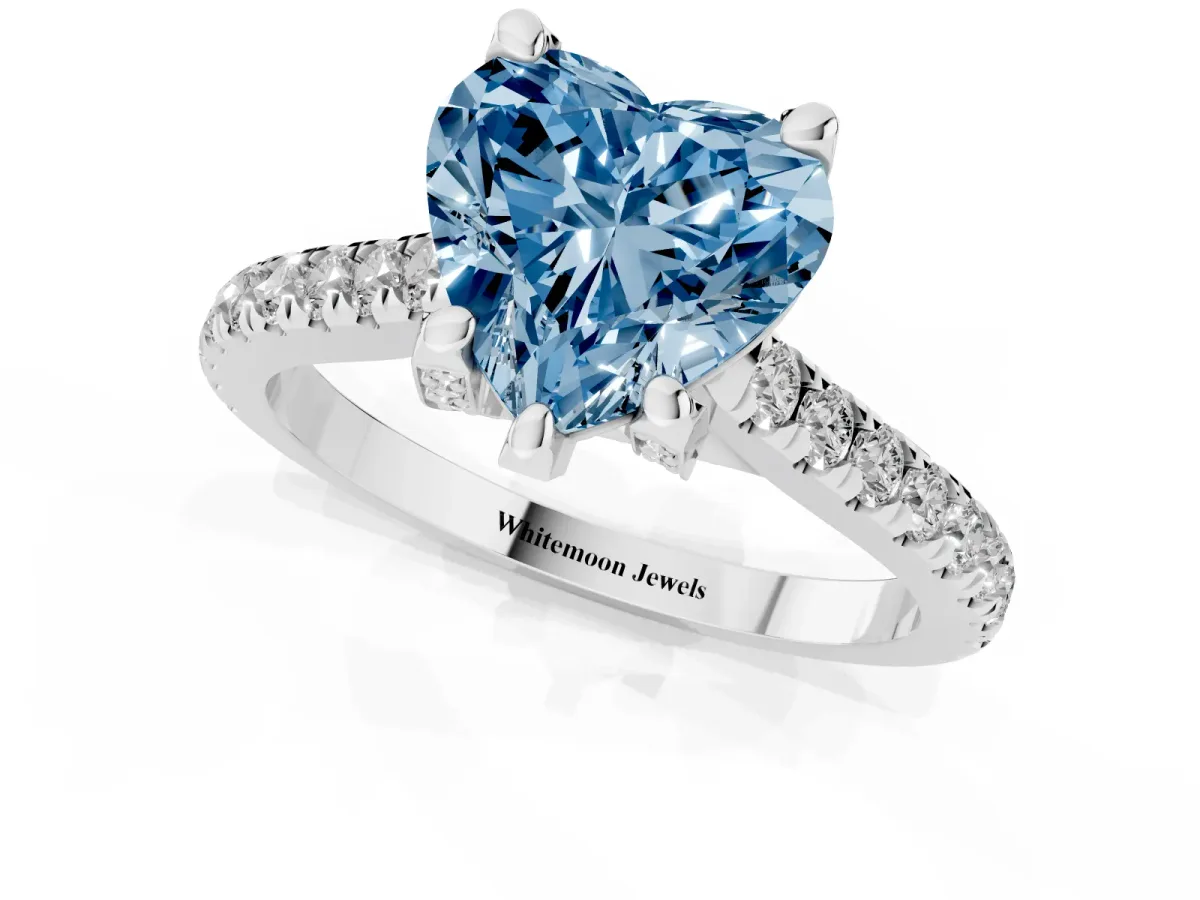Fancy Blue Heart Cut Brilliant Diamond Solitaire with Pavé Band and Four-Prong Setting Silver