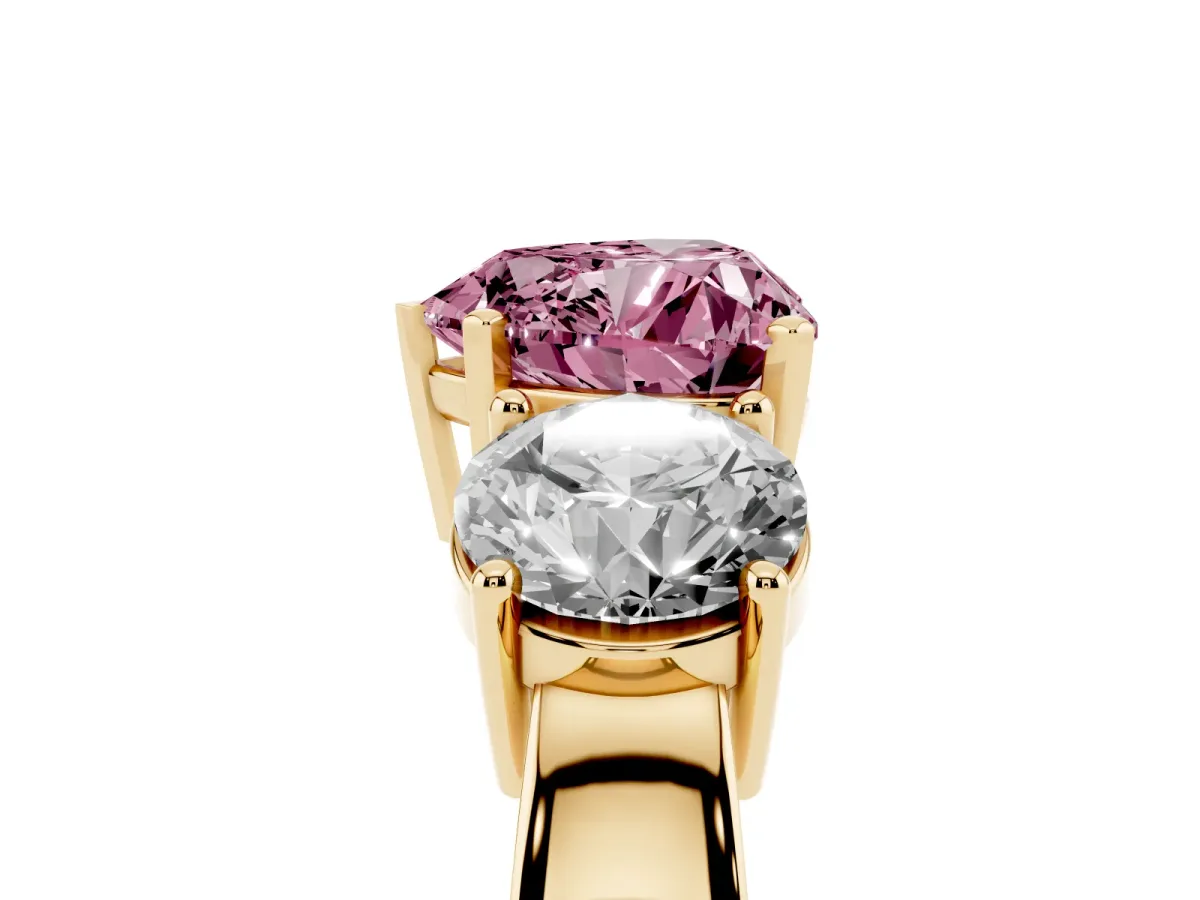 Fancy Pink Three-Stone Heart Cut Diamond Ring with Round Side Stones, Classic Band, and Four-Prong Setting Yellow gold