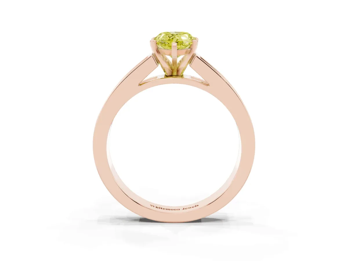 Fancy Yellow Pear Cut Solitaire Diamond Ring with Channel-Set Band and Four-Prong Setting Rose gold