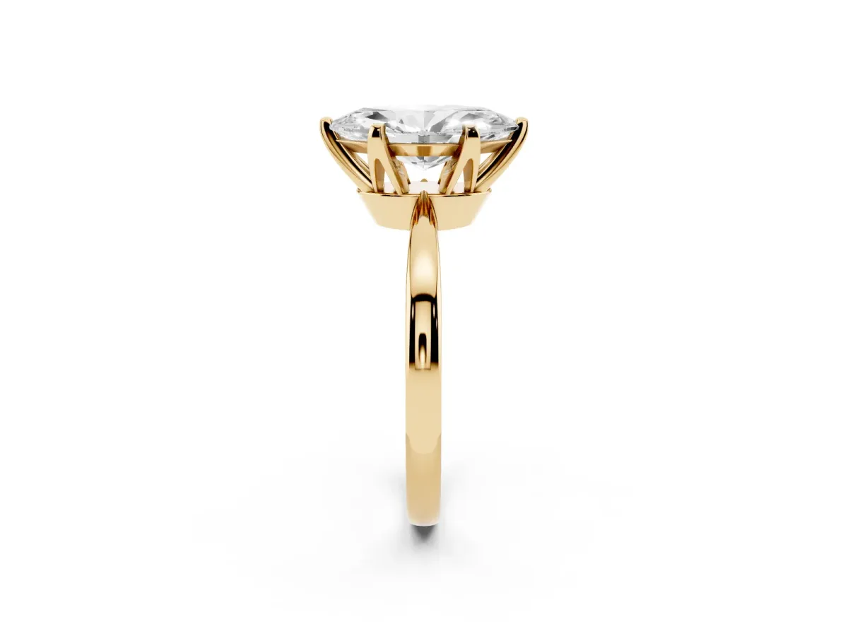 Marquise Cut Solitaire Engagement Ring with Six-Prong Setting and Tapered Band Yellow gold