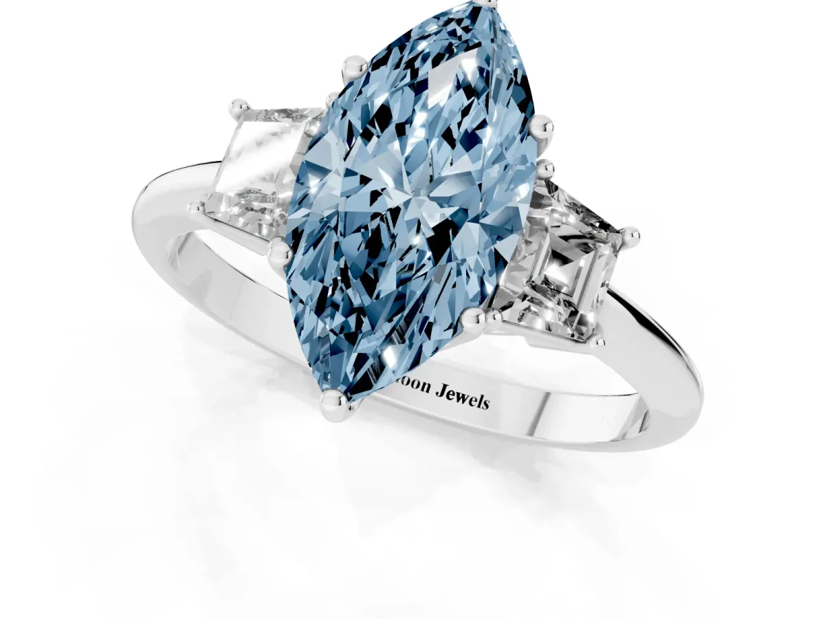 Fancy Blue Marquise Cut Diamond Three-Stone Ring with Trapezoid Side Stones and Prong Setting Silver