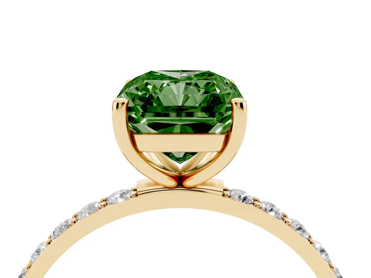 Fancy Green Radiant Cut Diamond Solitaire Ring with Round Pavé Shoulders and Prong Setting Yellow gold