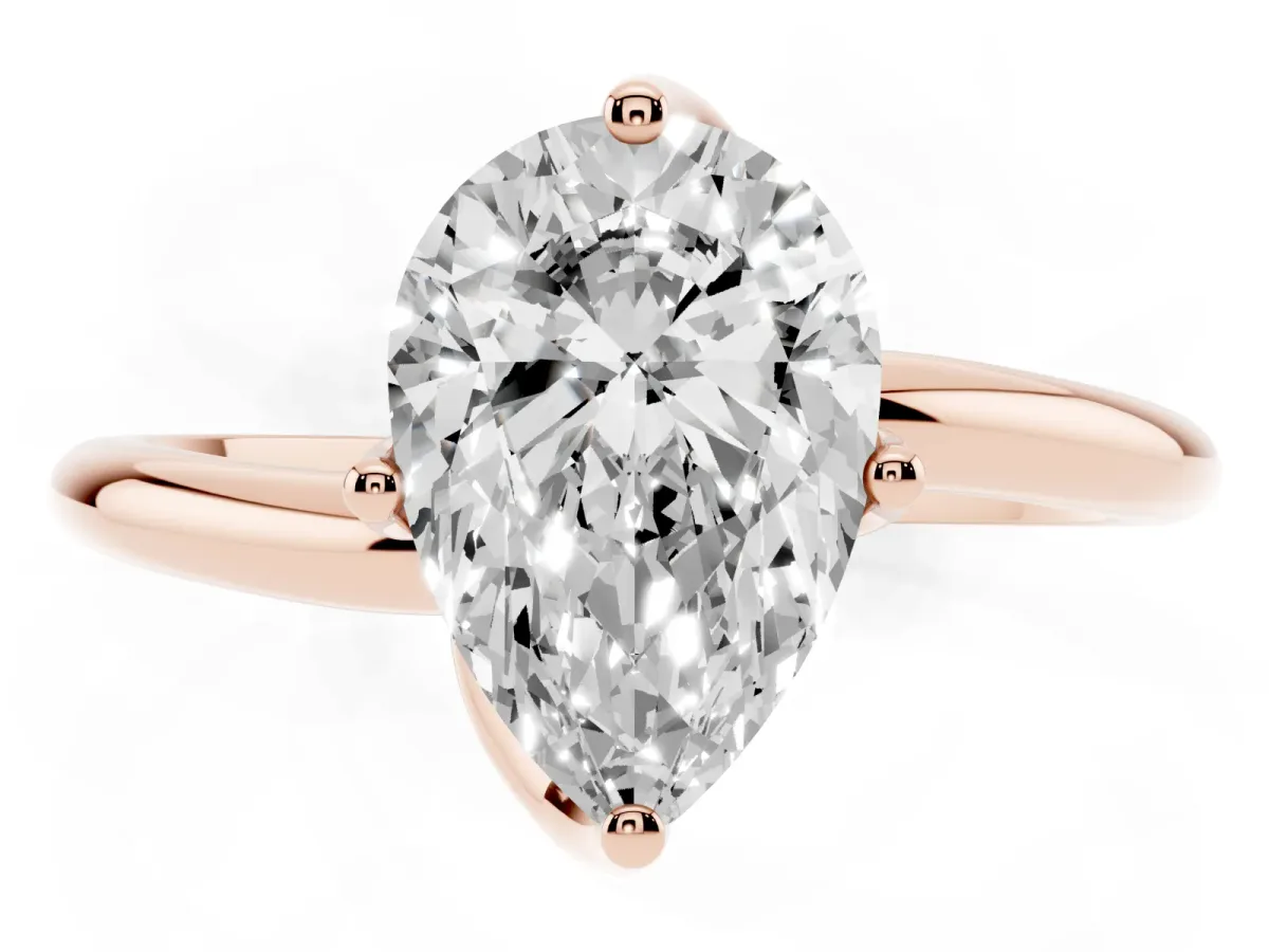 Pear Cut Diamond Solitaire Engagement Ring with Four-Prong Setting and Classic Band Rose gold