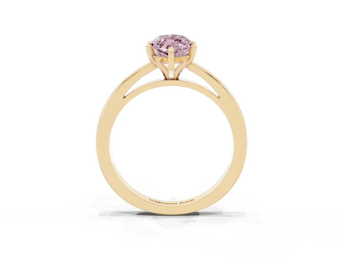 Fancy Pink Marquise Cut Solitaire Diamond Engagement Ring with Four-Prong Setting on a Classic Band Yellow gold