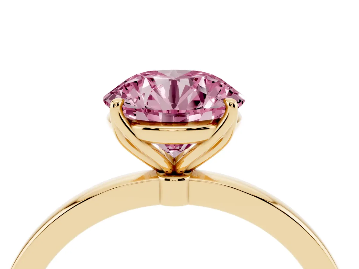 Fancy Pink Round Cut Diamond Solitaire Ring with Thin Band and Prong Setting Yellow gold
