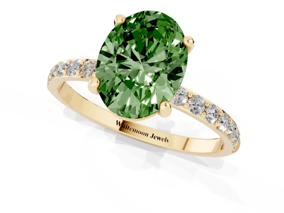 Fancy Green Oval Cut Diamond Solitaire Ring with Round Pavé Band and Prong Setting Yellow gold