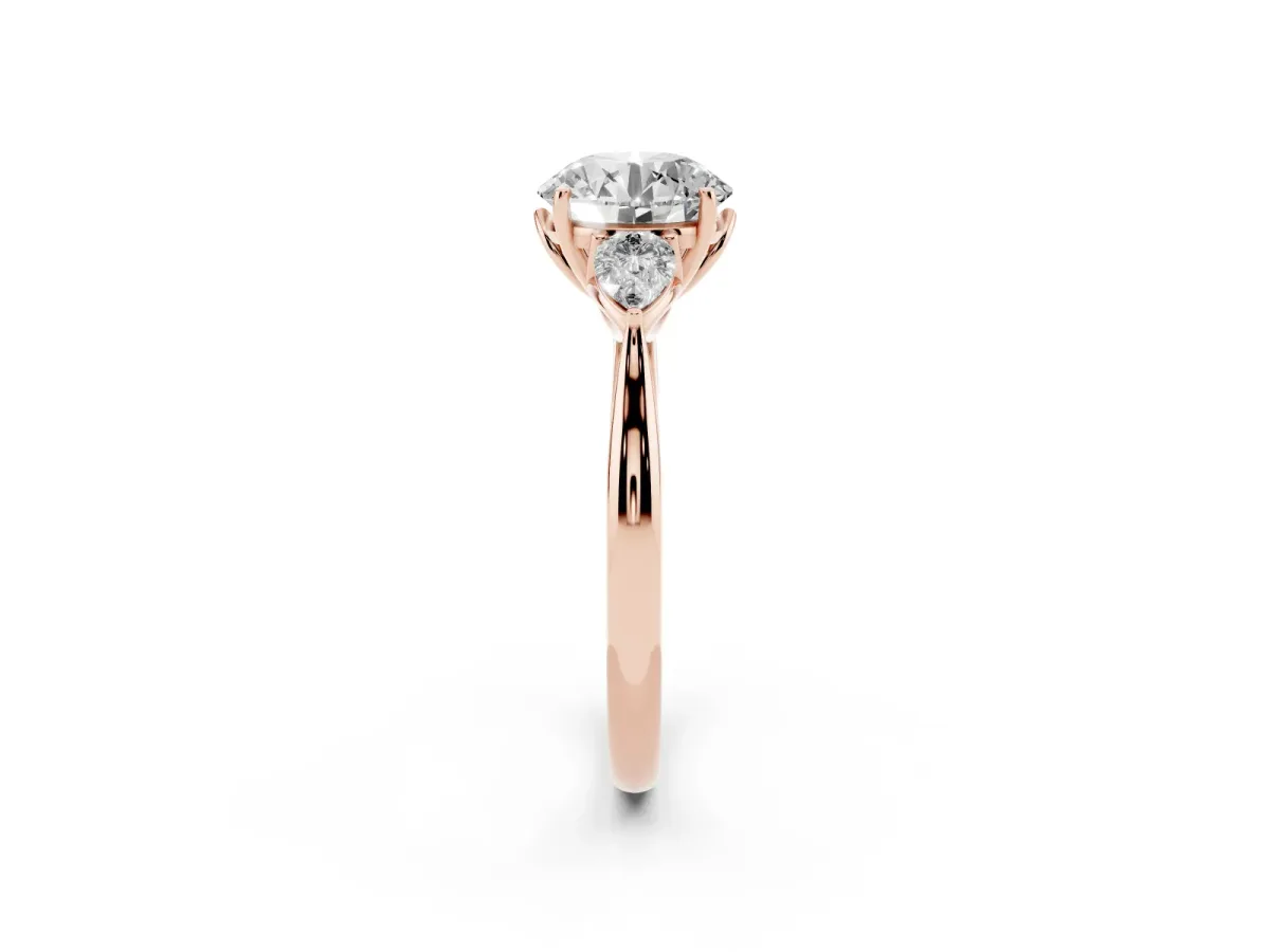 Three-Stone Round Cut Brilliant Diamond Solitaire Ring with Tapered Band and Four-Prong Setting Rose gold