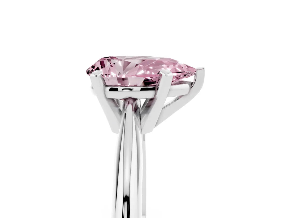 Fancy Pink Pear Cut Cut Solitaire Ring with Four-Prong Setting on a Classic Band Platinum