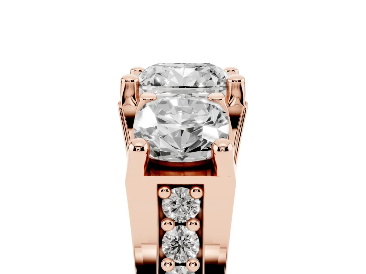Cushion Cut Diamond Three-Stone Ring with Channel Set Band and Four-Prong Setting Rose gold