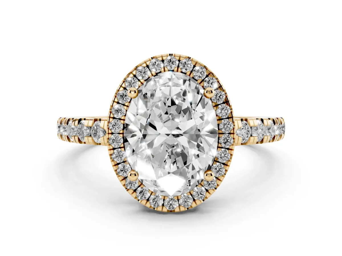 Oval Cut Diamond Halo Ring with Pavé Band and Four-Prong Setting Yellow gold