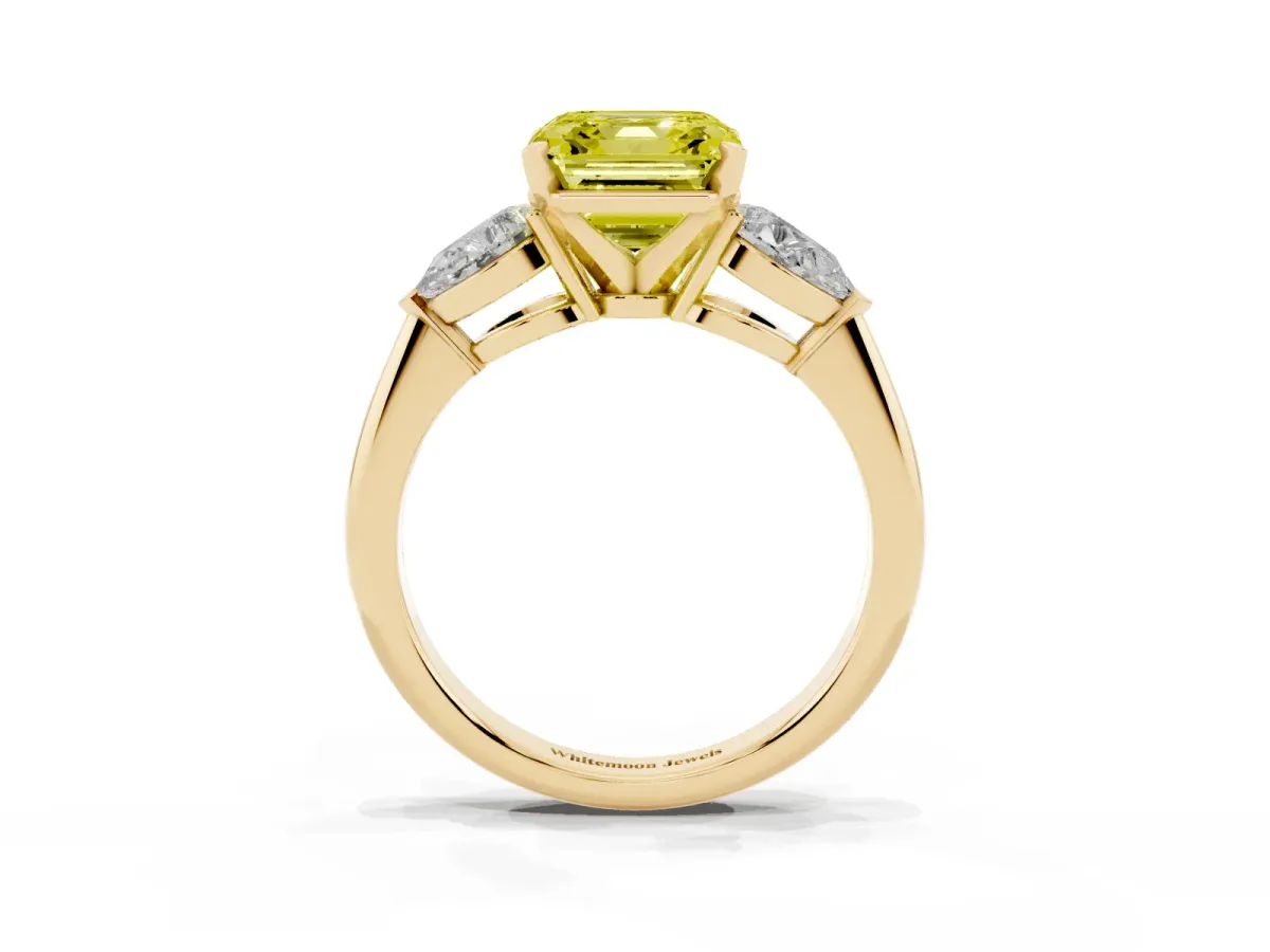 Fancy Yellow Three-Stone Asscher Cut Diamond Ring with Pear Side Stones and Four-Prong Setting Yellow gold