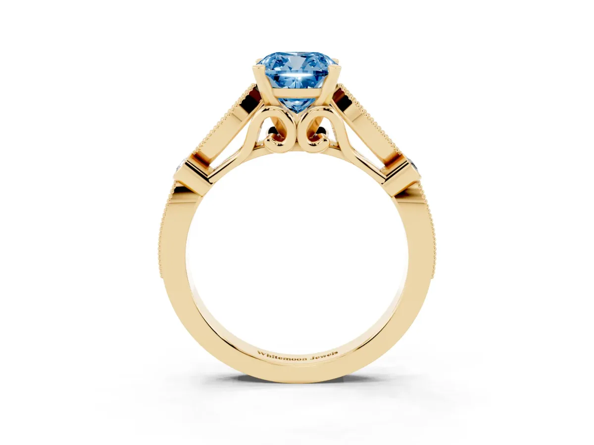 Fancy Blue Cushion Cut Cut Diamond with Milgrain Marquise and Bezel Accents on a Solitaire Band with Prong Setting Yellow gold