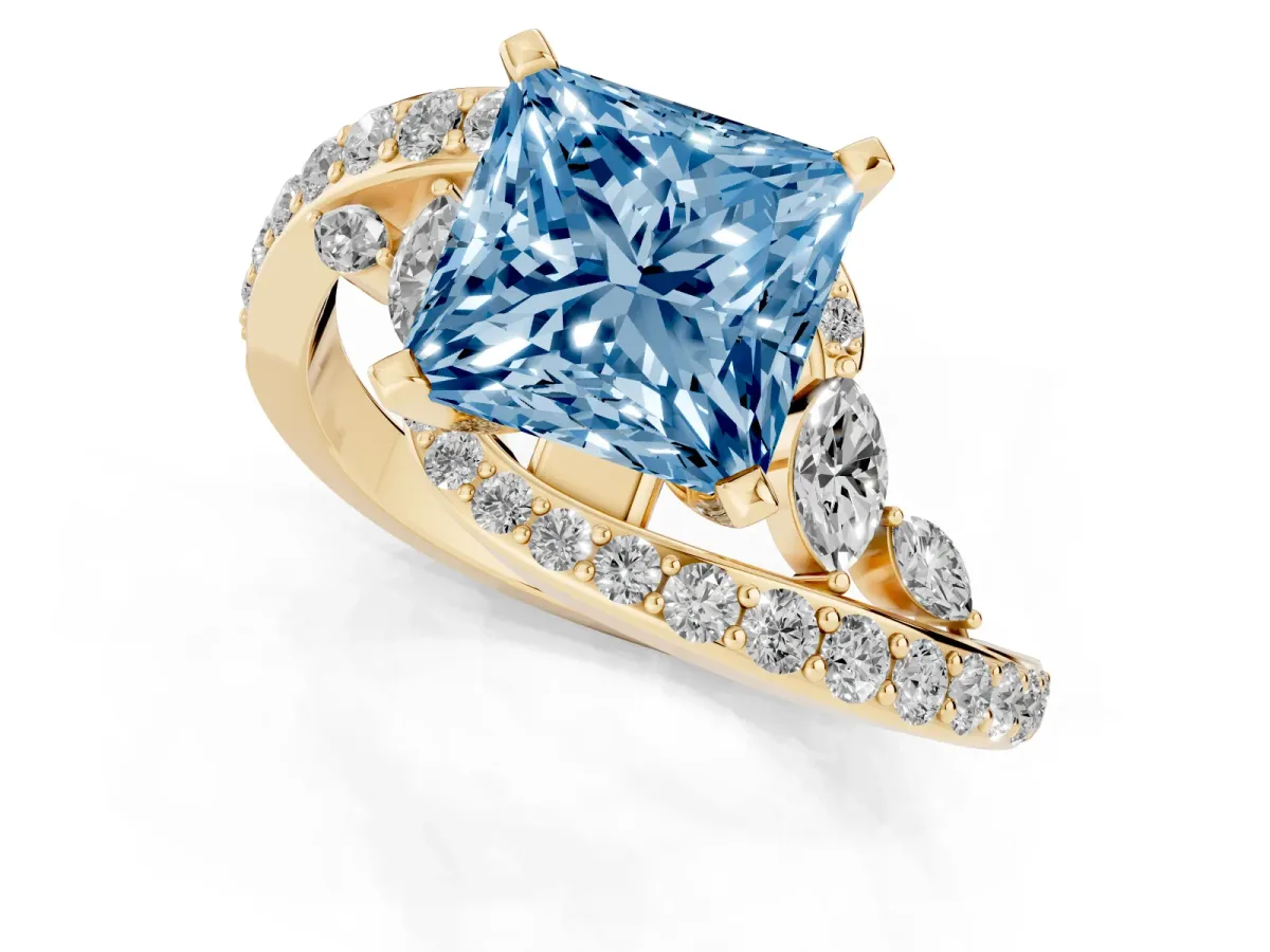Fancy Blue Princess Cut Solitaire with Pavé Twist Band and Four-Prong Setting Yellow gold