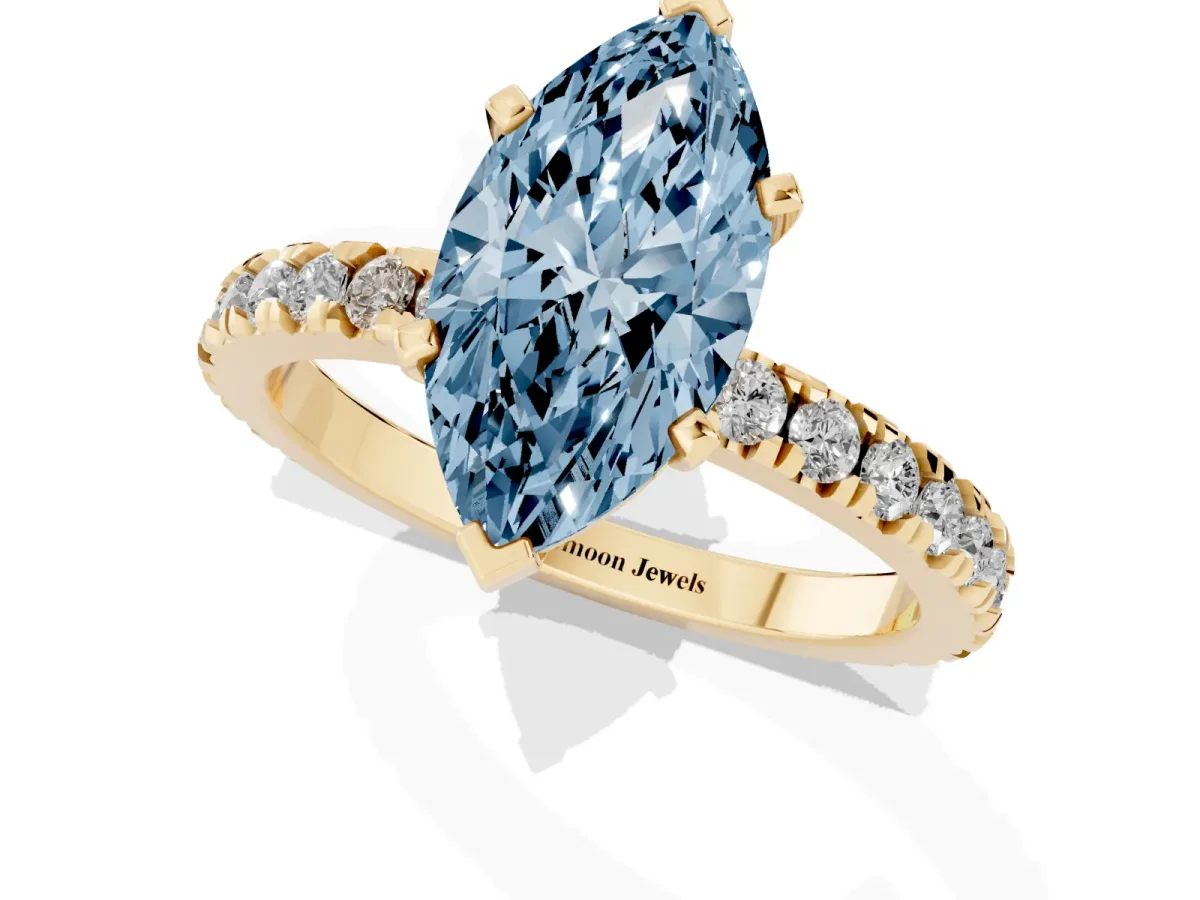 Fancy Blue Marquise Cut Diamond Pavé Band Solitaire with Four-Prong Setting Yellow gold
