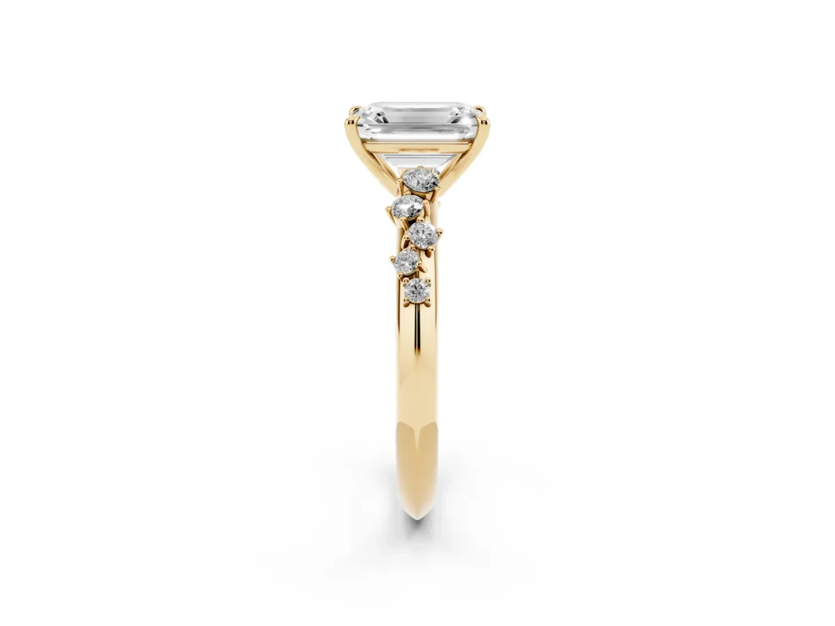 Emerald Cut Diamond Cluster Side Stone Solitaire Ring with Prong Setting Yellow gold