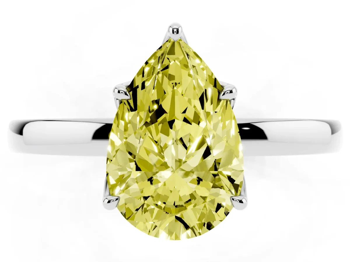 Fancy Yellow Pear Cut Diamond Solitaire Ring with Thin Band and Prong Setting Silver