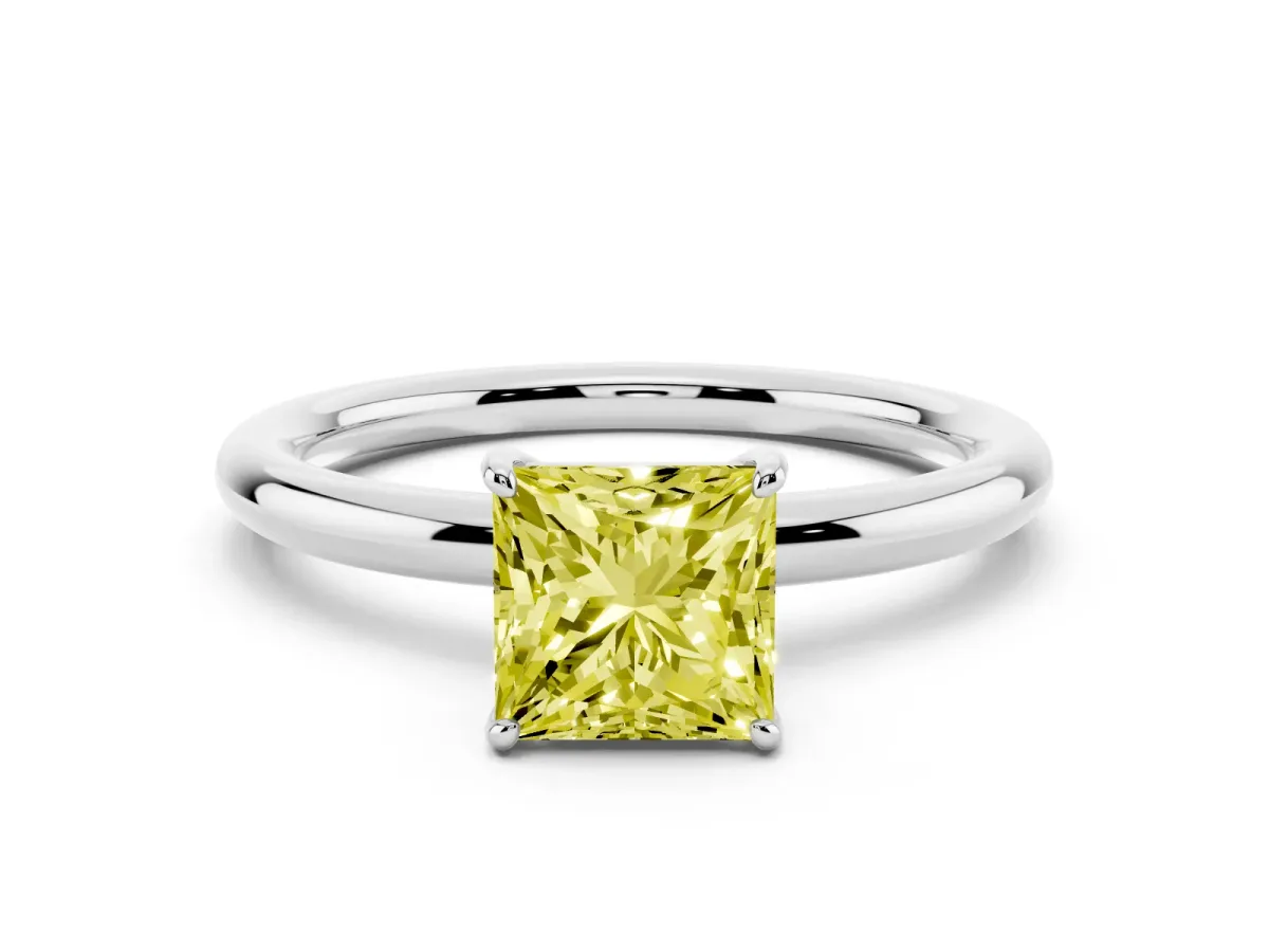 Fancy Yellow Princess Cut Solitaire Diamond Ring with Four-Prong Setting on a Plain Band Silver