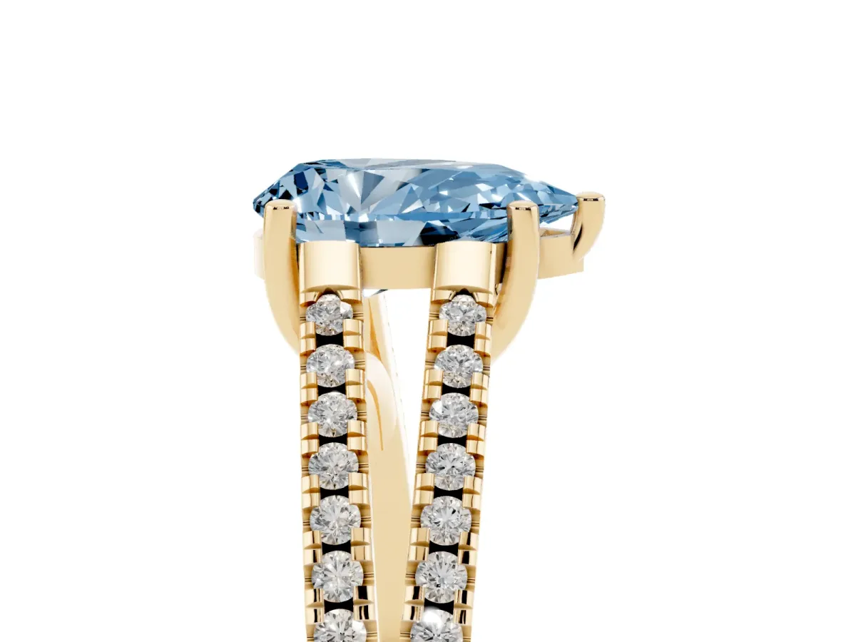 Fancy Blue Pear Cut Diamond Solitaire Engagement Ring with Split Shank Pavé Band Yellow gold