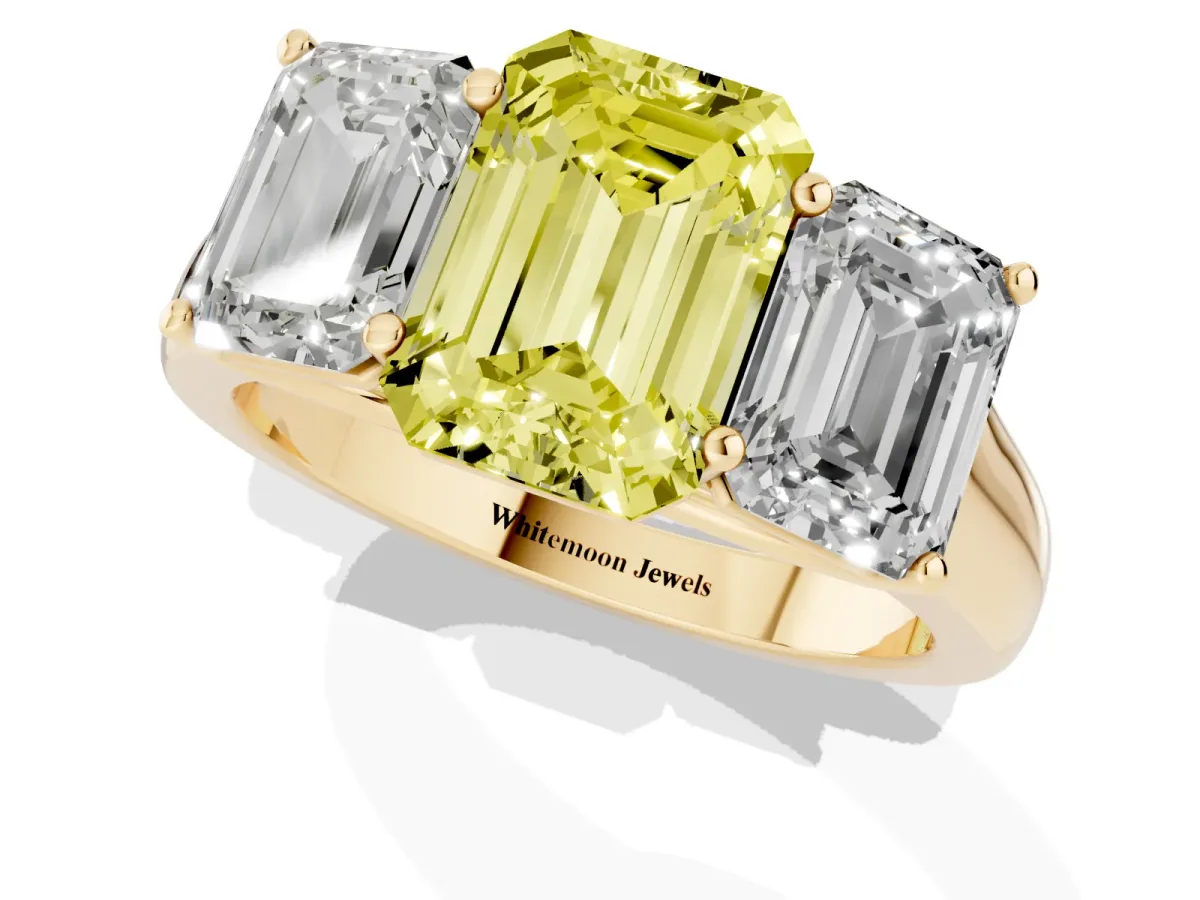 Fancy Yellow Emerald Cut Three-Stone Diamond Ring with Prong Setting on a Classic Band Yellow gold