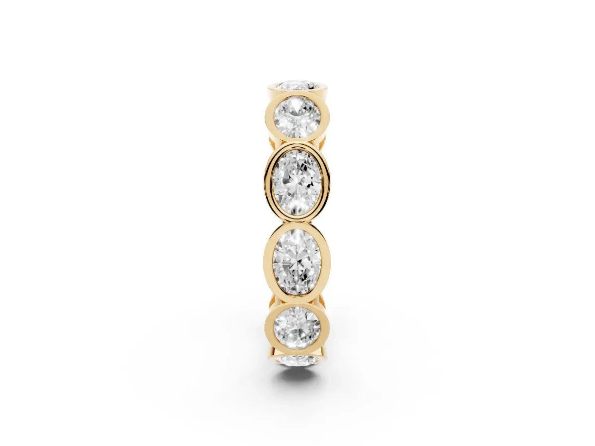 Oval Diamond Bezel Set Eternity Wedding Band Yellow gold