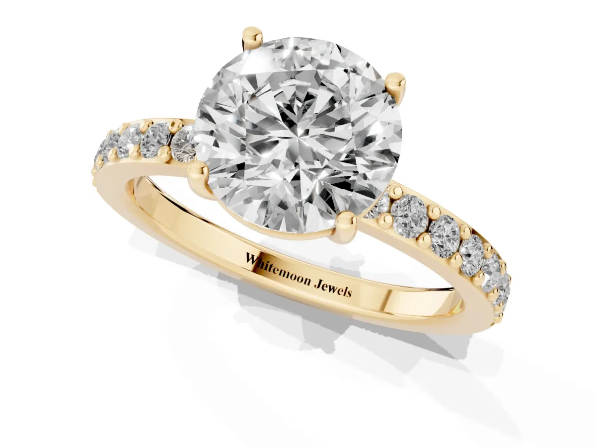 Round Cut Cut Diamond Solitaire with Pave Band and Four-Prong Setting Yellow gold