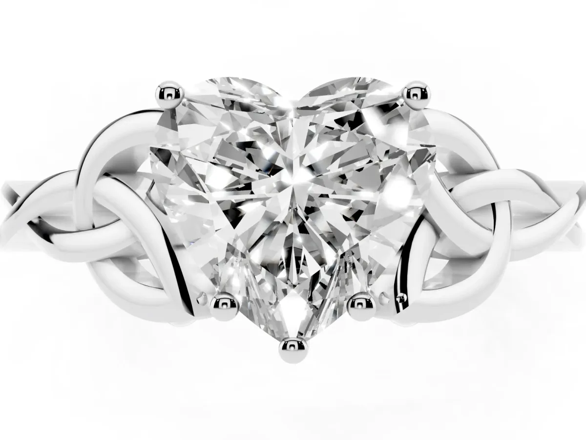 Heart Cut Diamond Solitaire Engagement Ring with Celtic Knot Band and Four-Prong Setting Platinum