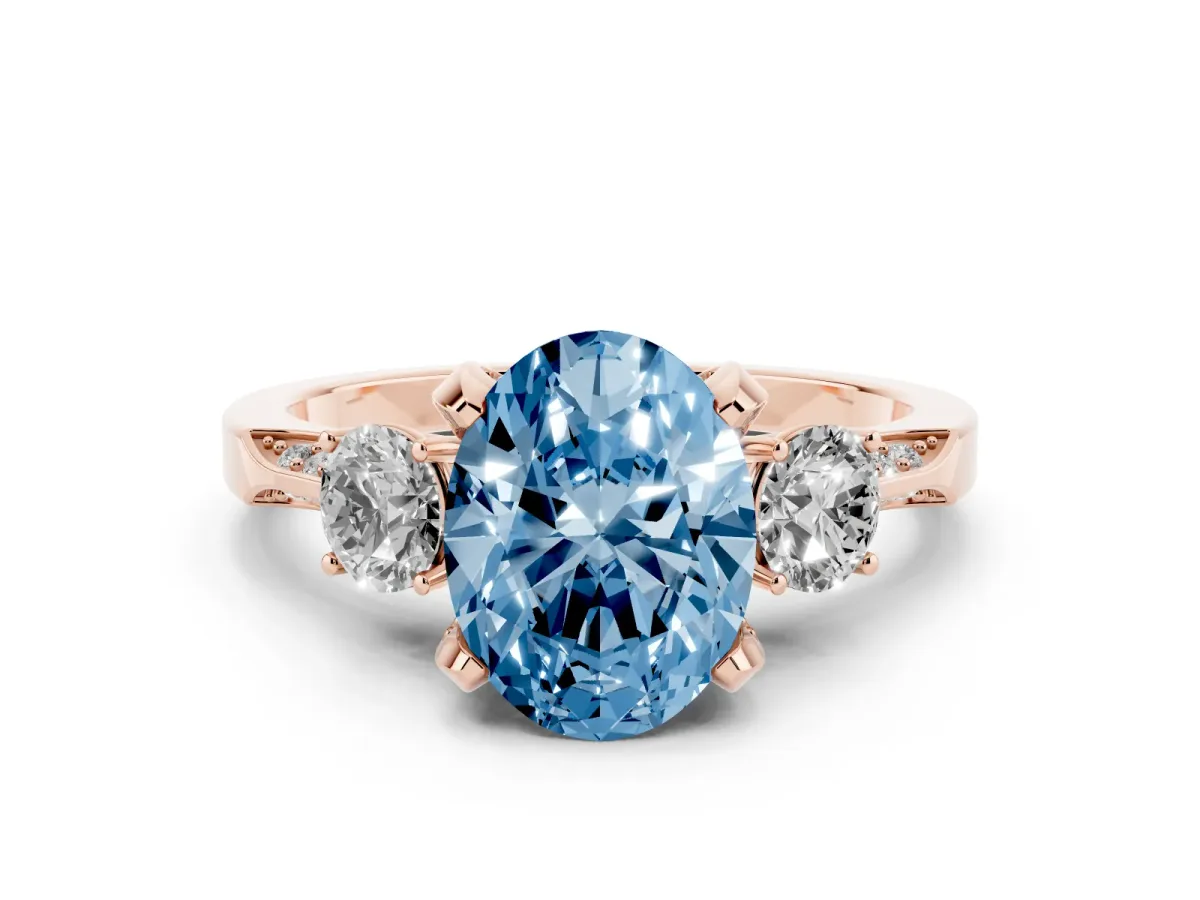 Fancy Blue Oval Cut Brilliant Three-Stone Diamond Ring with Pavé Band and Four-Prong Setting Rose gold