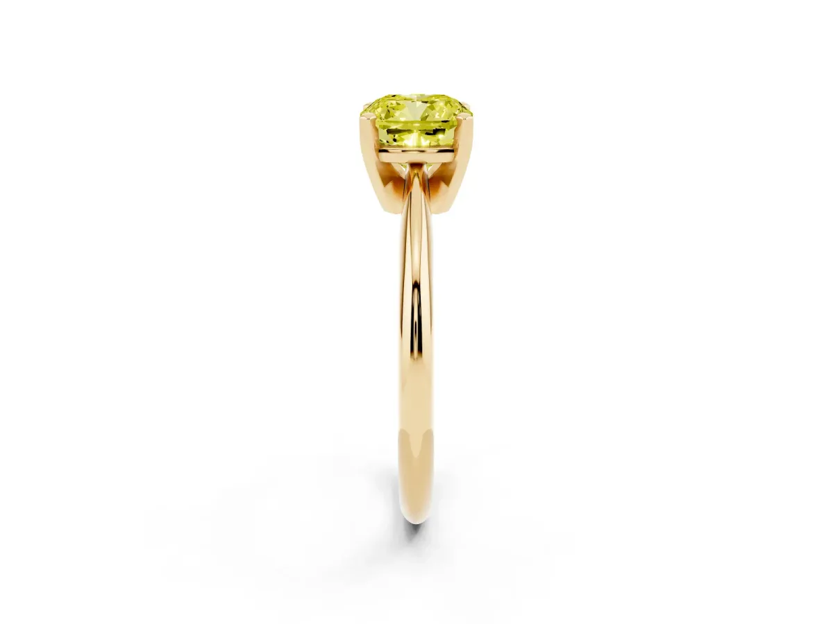 Fancy Yellow Cushion Cut Cut Solitaire Ring with Four-Prong Setting on a Classic Band Yellow gold