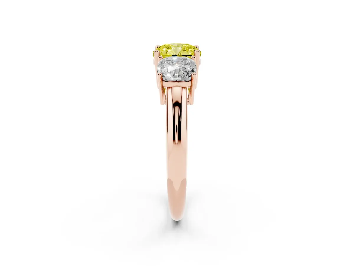 Fancy Yellow Three-Stone Cushion Cut Cut Diamond Engagement Ring with Prong Setting on a White Gold Band Rose gold