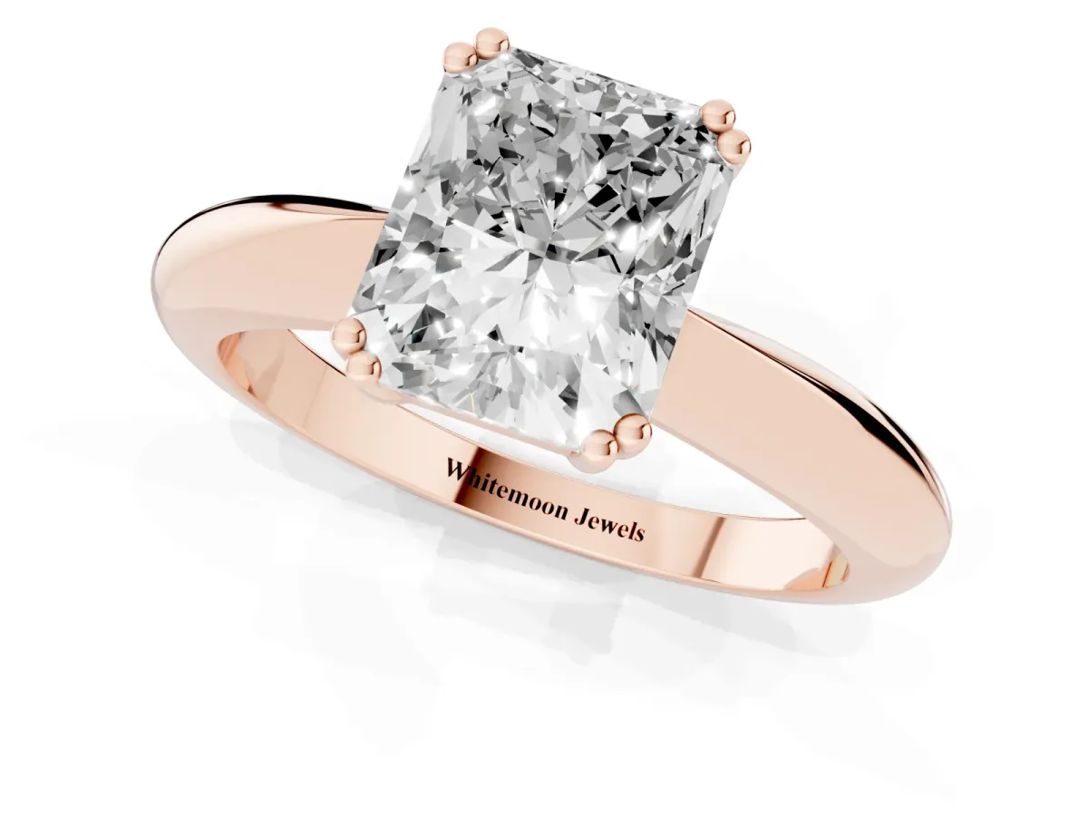 Radiant Cut Cut Solitaire Engagement Ring with Tapered Band and Four-Prong Setting Rose gold