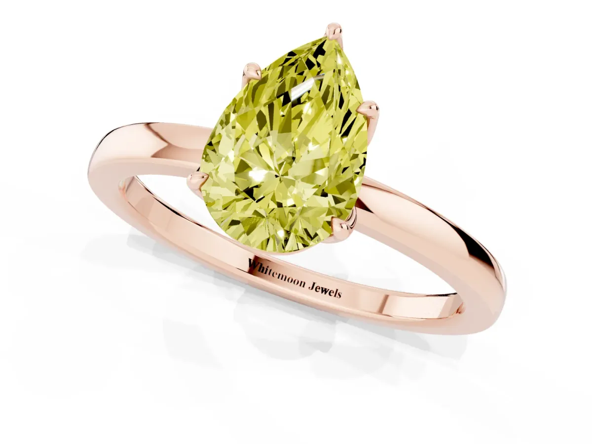 Fancy Yellow Pear Cut Diamond Solitaire Ring with Thin Band and Prong Setting Rose gold