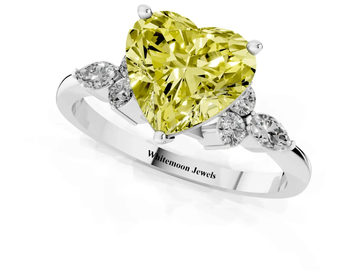 Fancy Yellow Heart Cut Brilliant Diamond Solitaire Ring with Pear Side Stones and Four-Prong Setting Silver