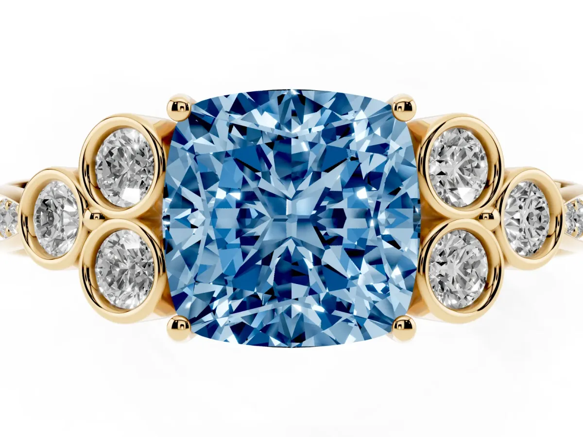 Fancy Blue Cushion Cut Cut Diamond Engagement Ring with Bezel Set Round Side Stones and Prong Setting Yellow gold