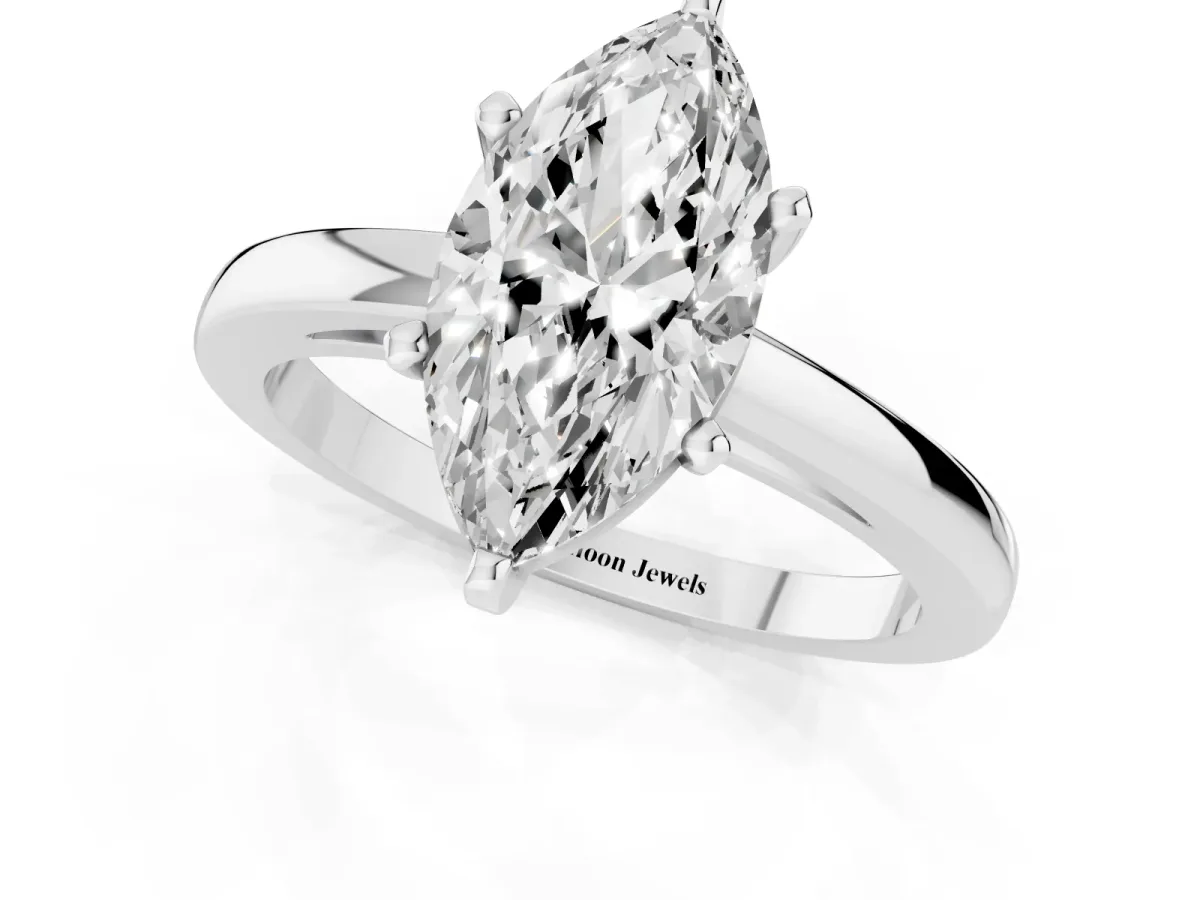 Marquise Cut Solitaire Diamond Engagement Ring with Four-Prong Setting on a Classic Band Silver