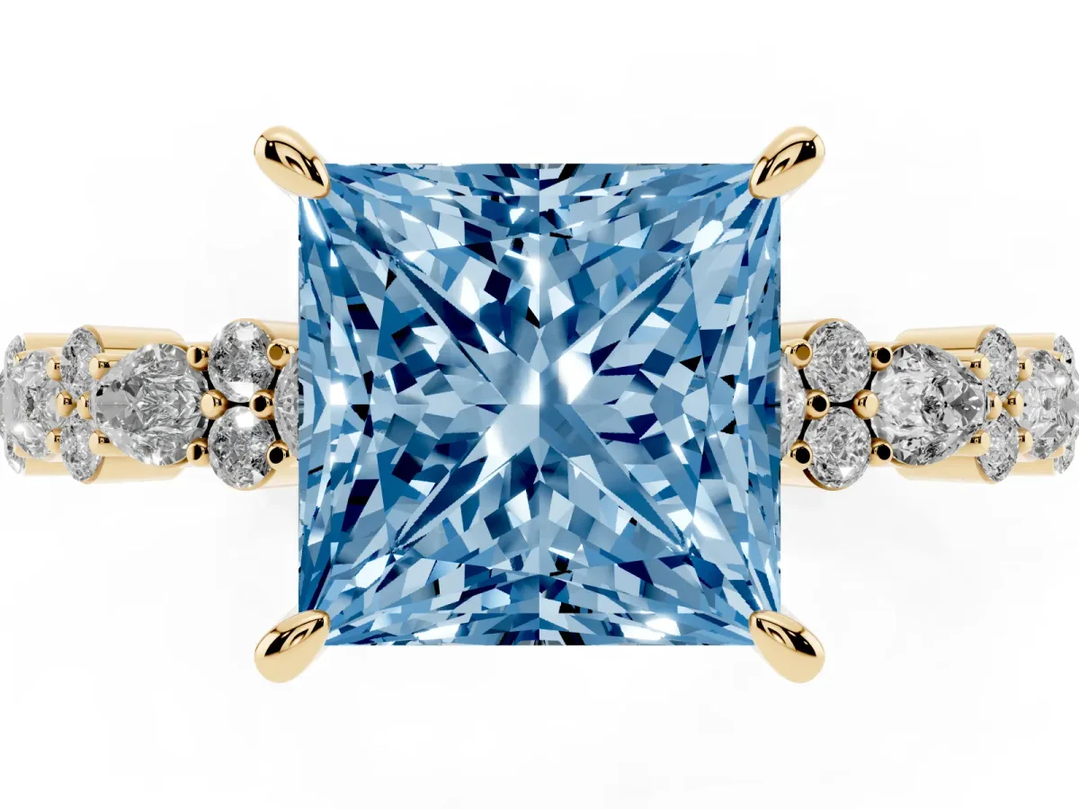 Fancy Blue Princess Cut Diamond Side Stone Solitaire Ring with Round and Four-Prong Setting Yellow gold