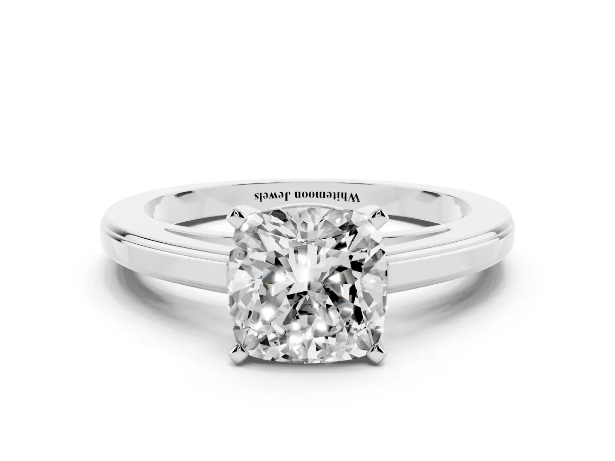 Cushion Cut Solitaire Diamond Ring with Four-Prong Setting and Classic Band Silver