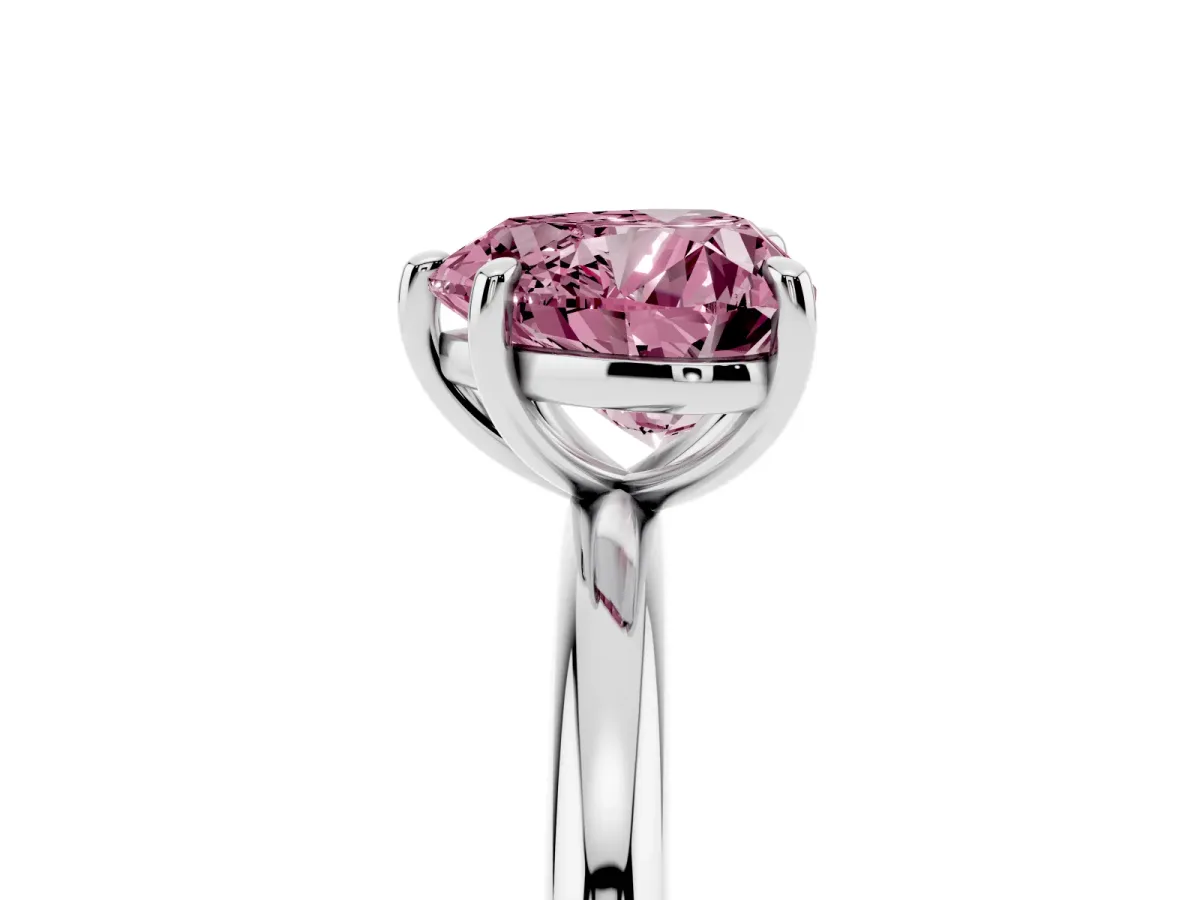 Fancy Pink Heart Cut Solitaire Diamond Ring with Four-Prong Setting on a Plain Band Platinum