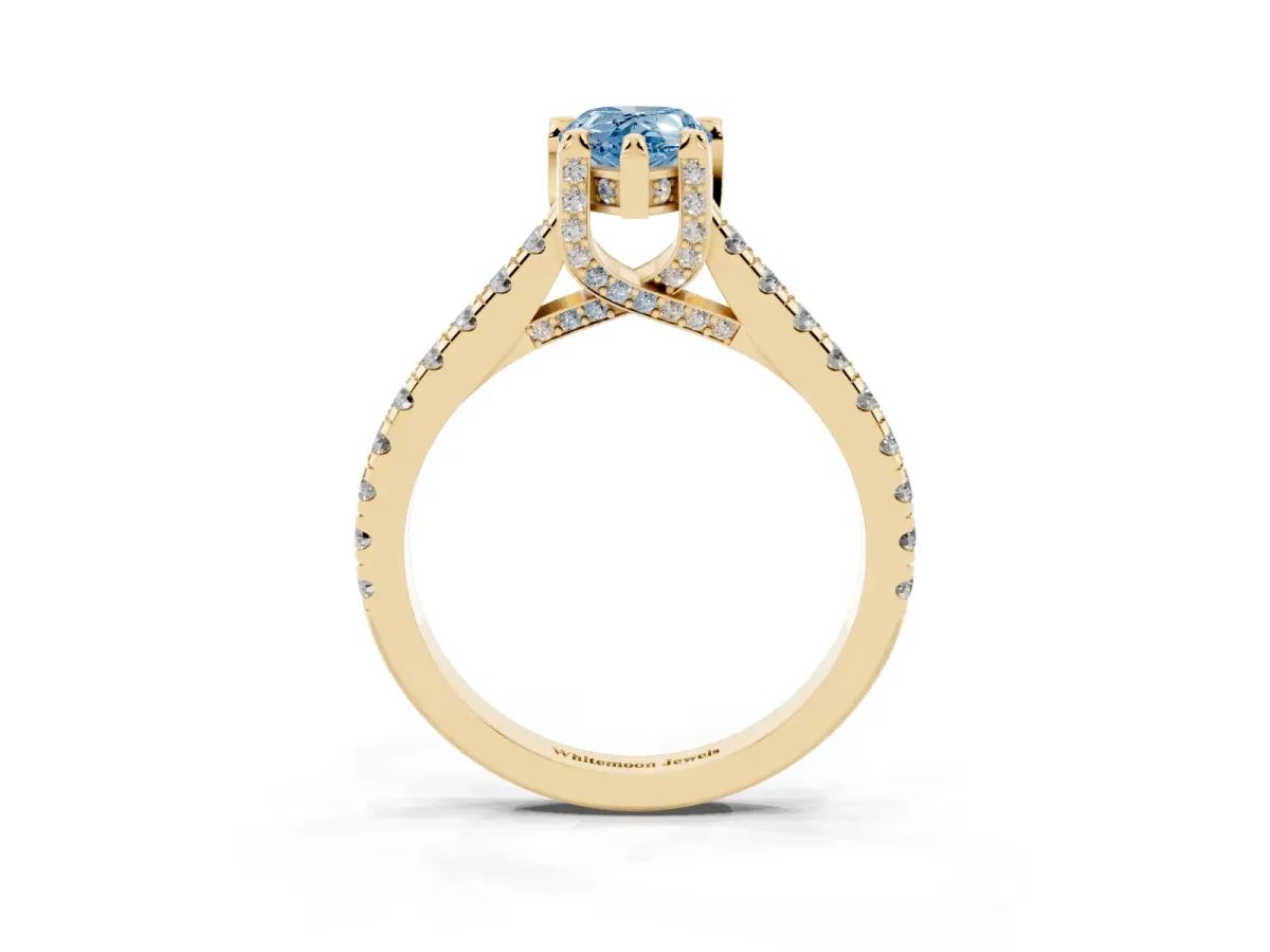 Fancy Blue Pear Cut Brilliant Diamond Solitaire with Pavé Band and Four-Prong Setting Yellow gold
