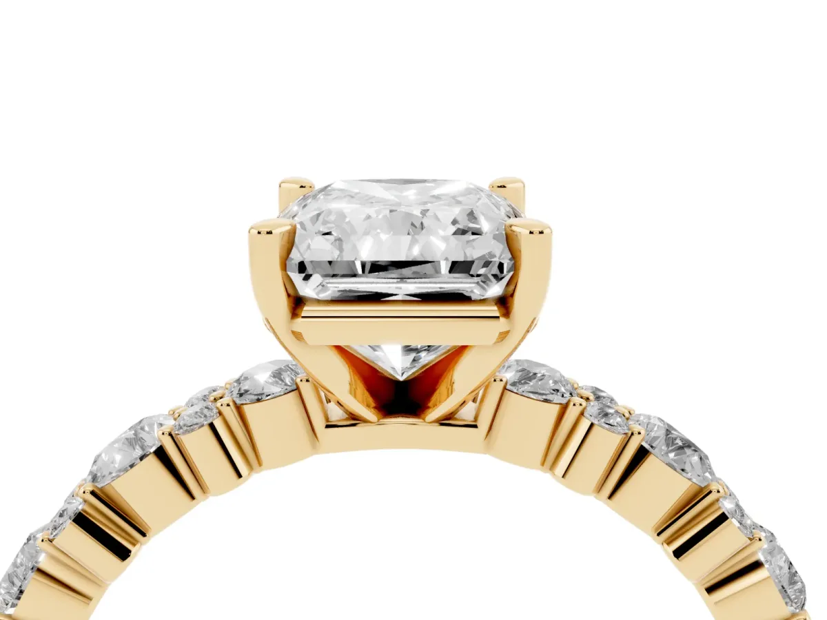 Radiant Cut Diamond Side Stone Solitaire Ring with Round and Four-Prong Setting Yellow gold