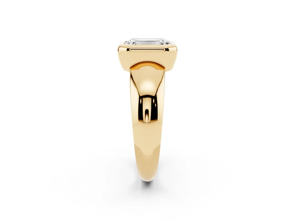 Bezel Set Emerald Cut Solitaire Ring with Wide Band Yellow gold