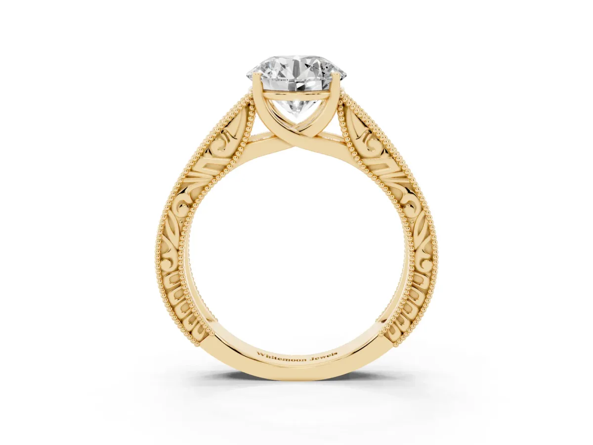 Round Cut Diamond Solitaire Ring with Engraved Band and Four-Prong Setting Yellow gold