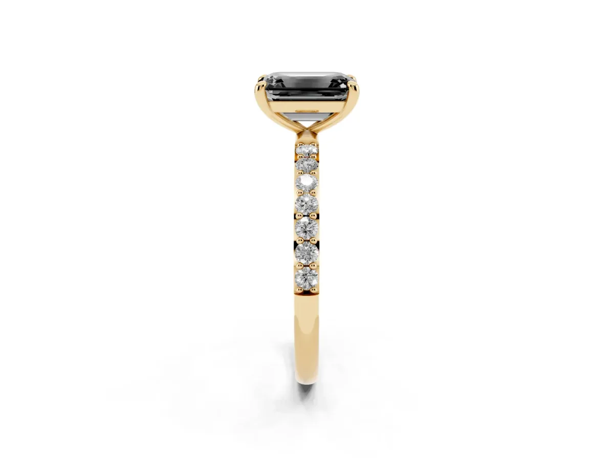 Fancy Black Emerald Cut Diamond Solitaire Ring with Round Pavé Band and Prong Setting Yellow gold