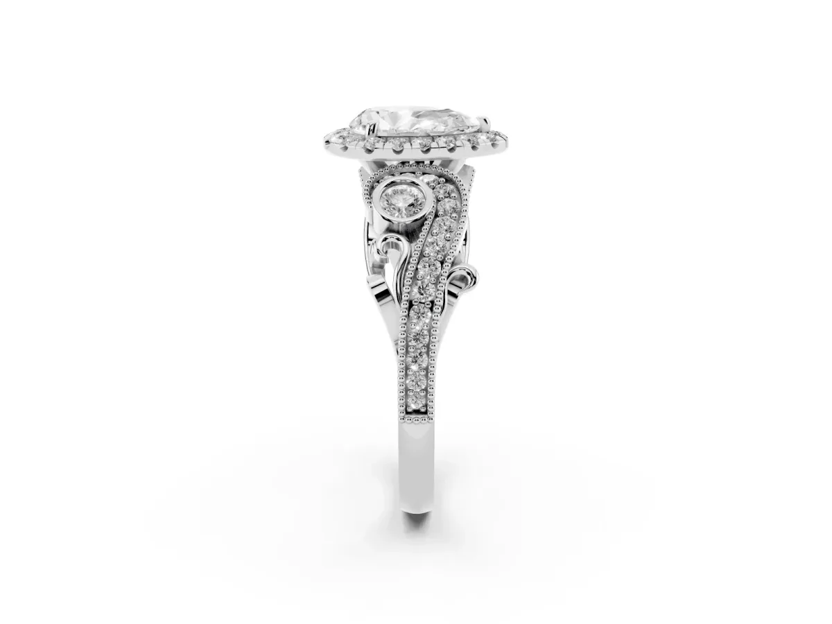 Pear Cut Halo Diamond Ring with Milgrain and Bezel Accents on a Split Shank Band Platinum