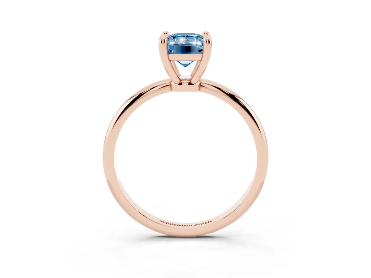 Fancy Blue Emerald Cut Solitaire Diamond Ring with 4-Prong Setting on a Classic Band Rose gold