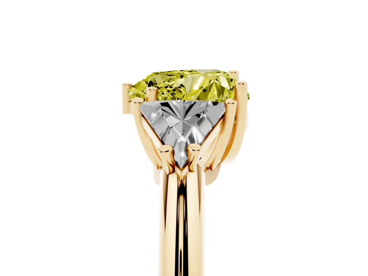 Fancy Yellow Three-Stone Heart Cut Diamond Engagement Ring with Trillion Side Stones and Prong Setting Yellow gold