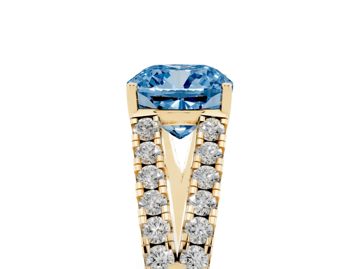 Fancy Blue Cushion Cut Diamond Split Shank Pavé Engagement Ring with Four-Prong Setting Yellow gold