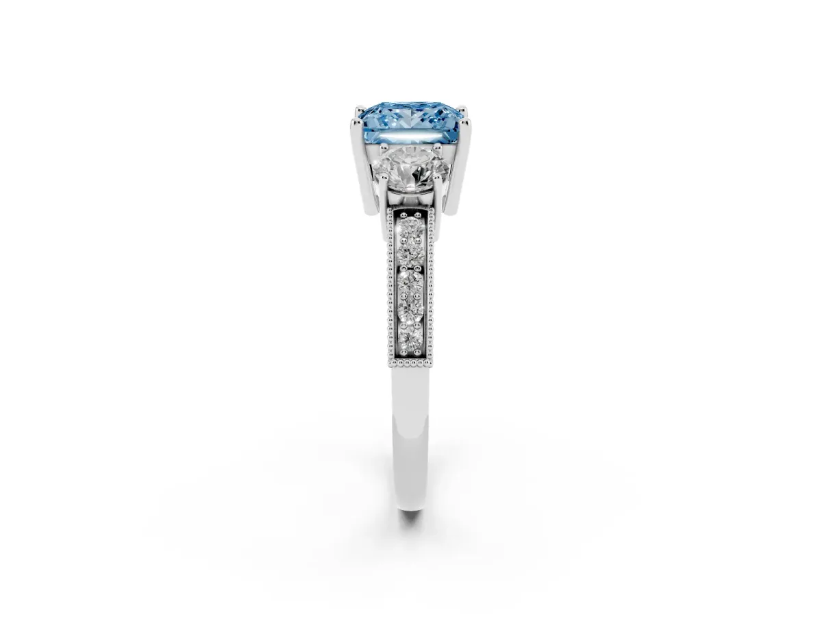 Fancy Blue Princess Cut Three-Stone Diamond Ring with Pavé Band and Four-Prong Setting Silver