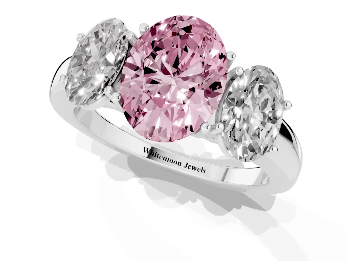 Fancy Pink Oval Cut Diamond Three-Stone Ring with Four-Prong Setting and Classic Band Silver