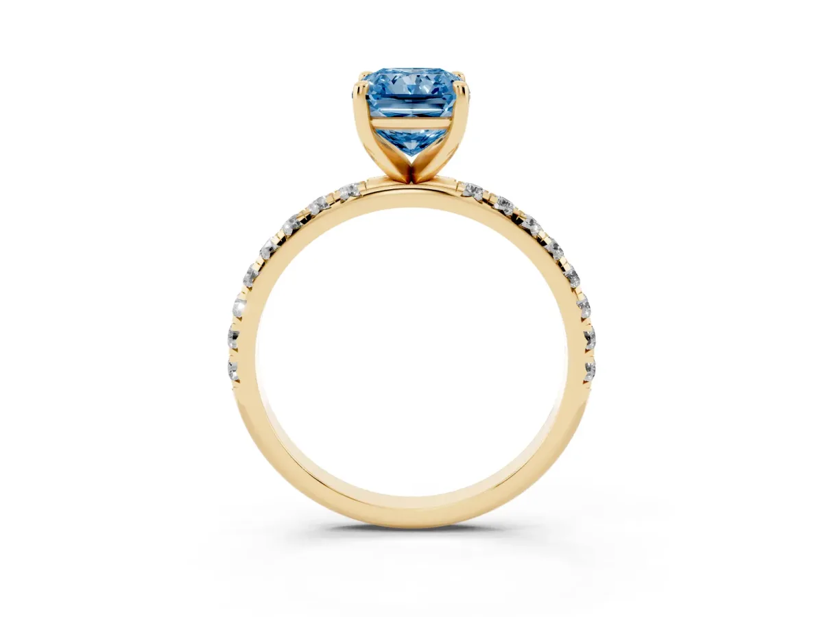 Fancy Blue Radiant Cut Cut Diamond Solitaire Ring with Micro Pave Band and Four Prong Setting Yellow gold